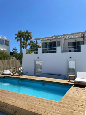 Minimal Blue Apartment with Sunset View in Paros
